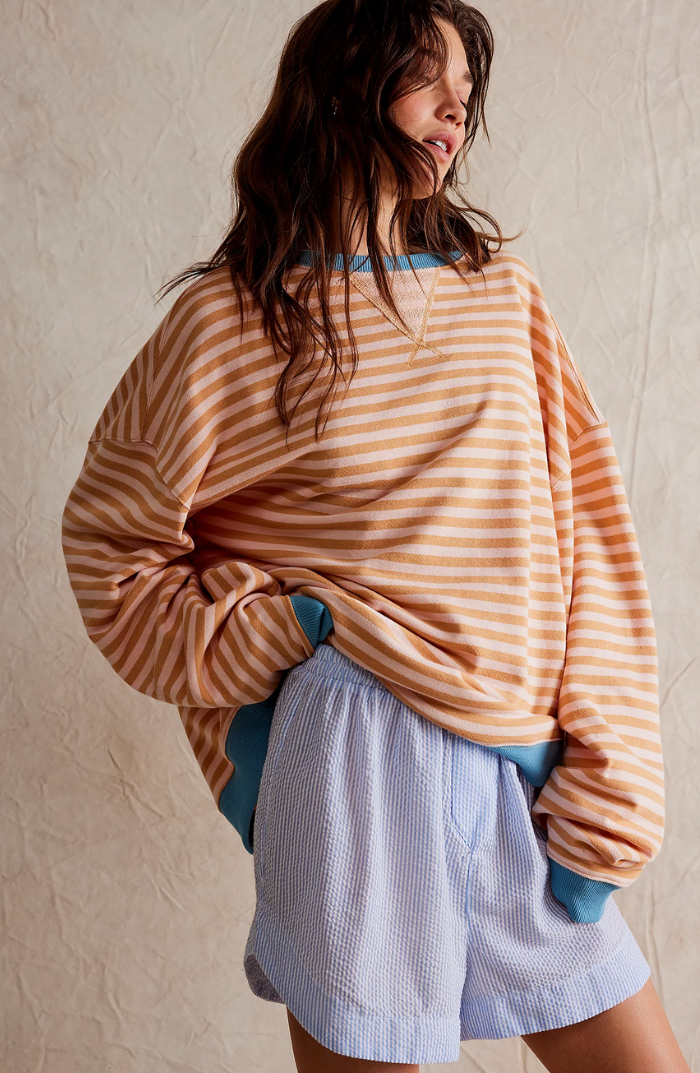 Women's oversized striped sweater in orange stripe
