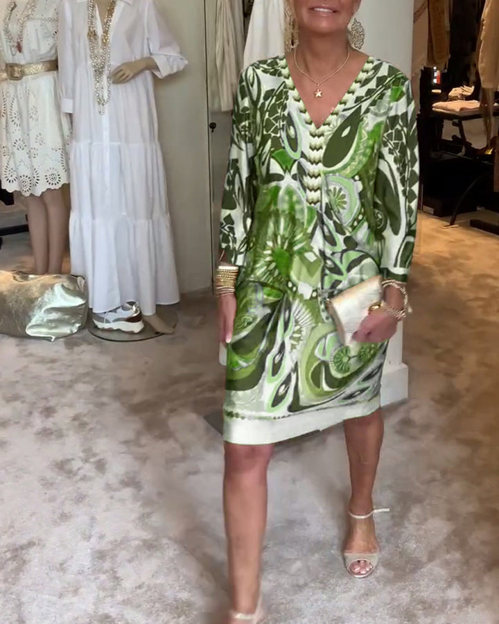 Sunburst print tunic midi dress in green