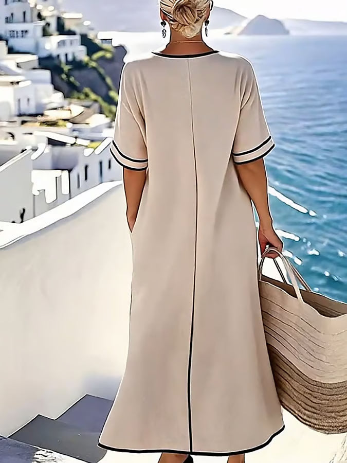 Beige maxi dress with bow detail at the waist
