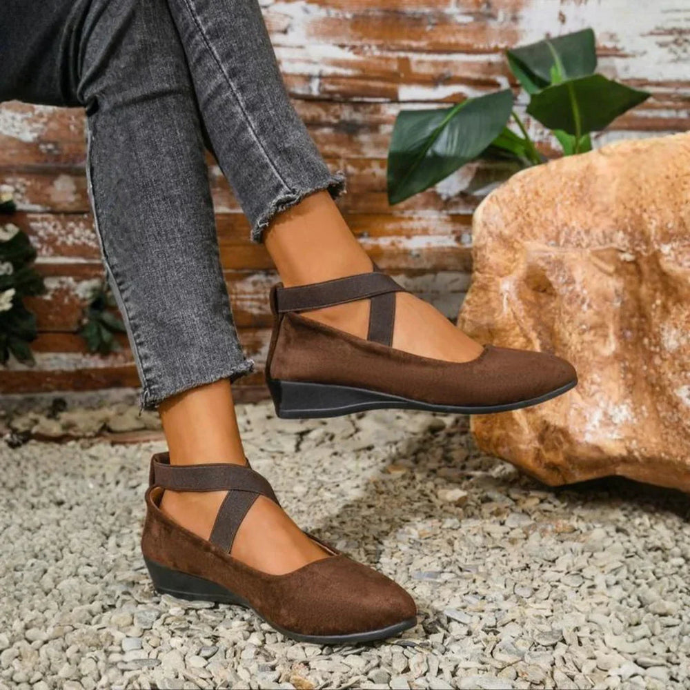 Women's closed toe wedge slip on shoe in brown