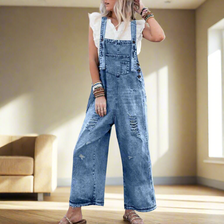 Women's vintage wash adjustable strap jumpsuit in blue