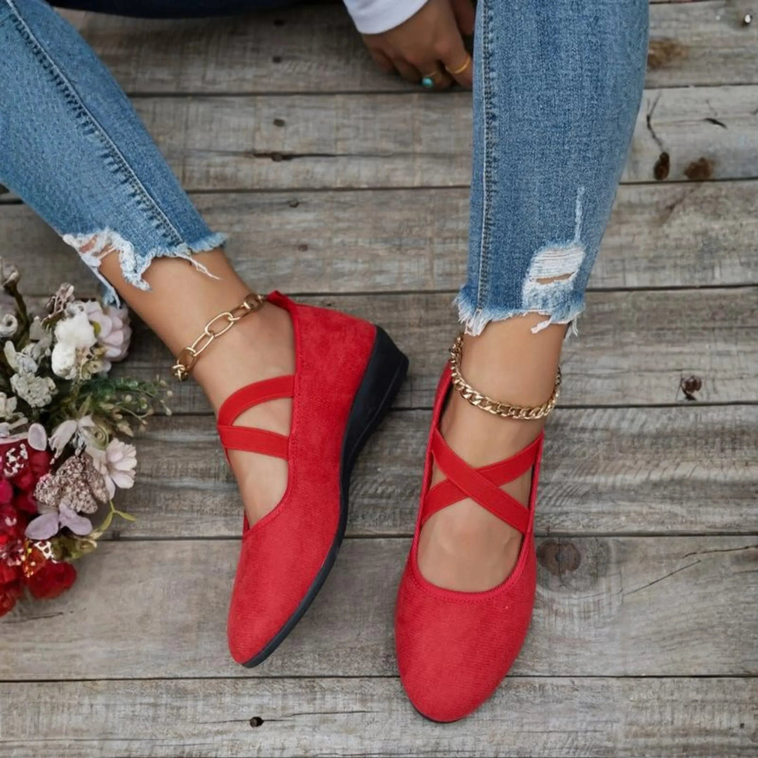 Women's closed toe wedge slip on shoe in red