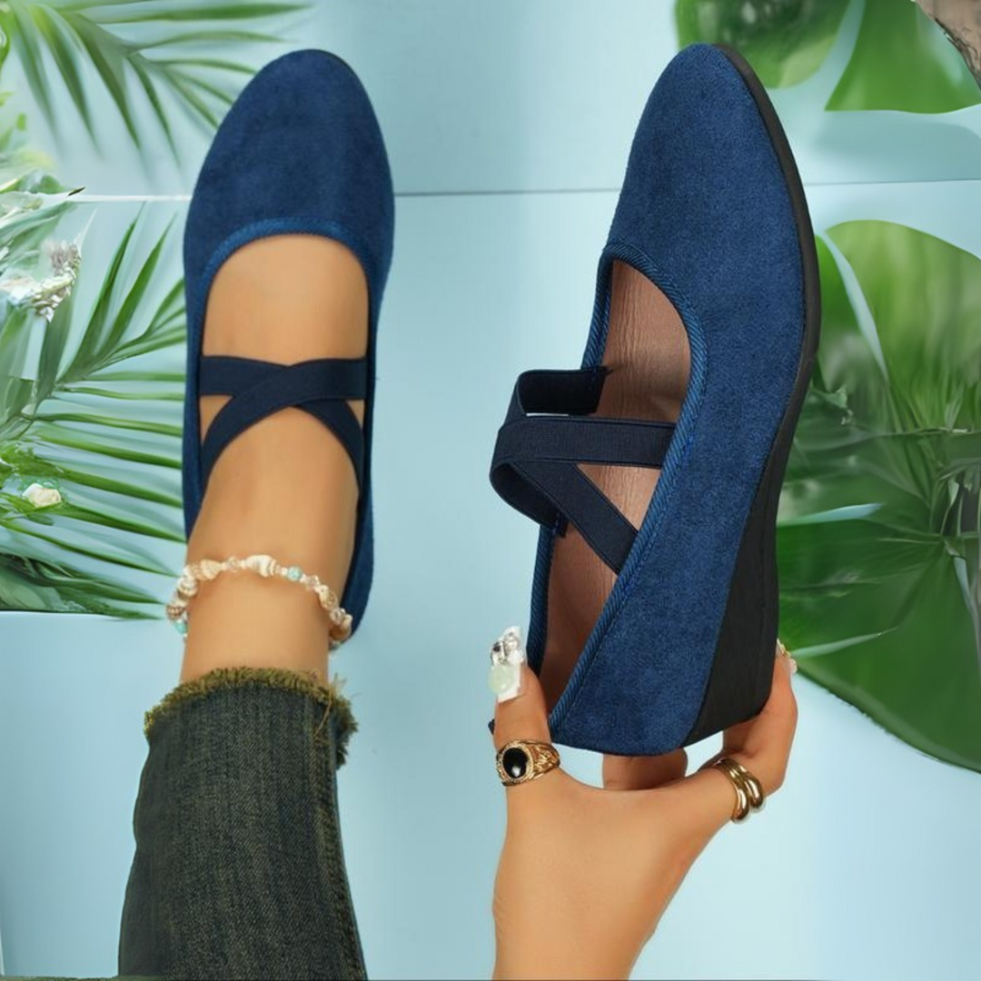 Women's closed toe wedge slip on shoe in blue