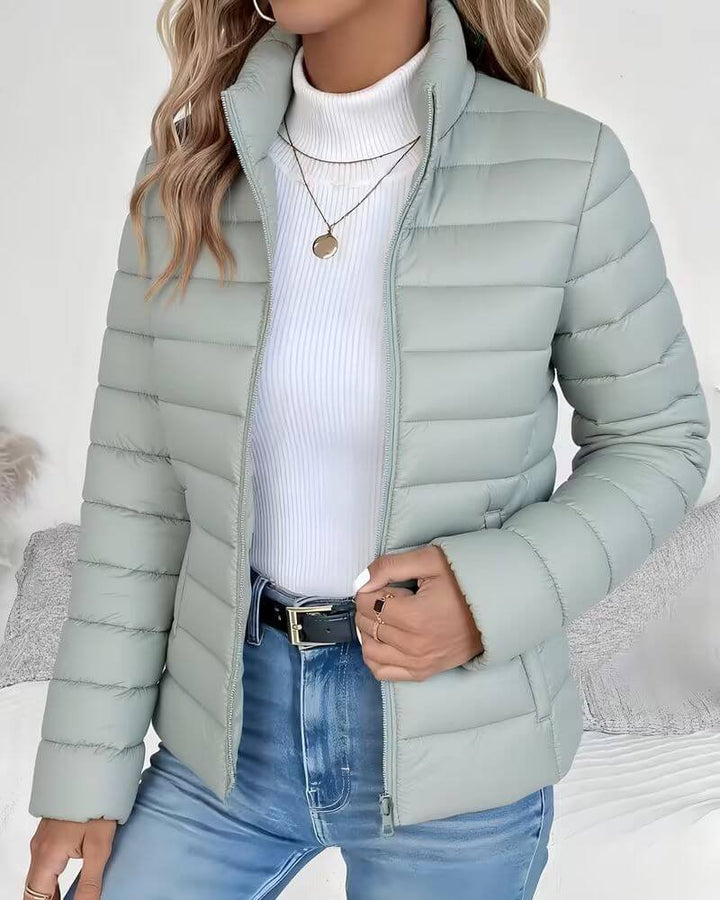 Green channel quilted fall jacket with high zip collar for women