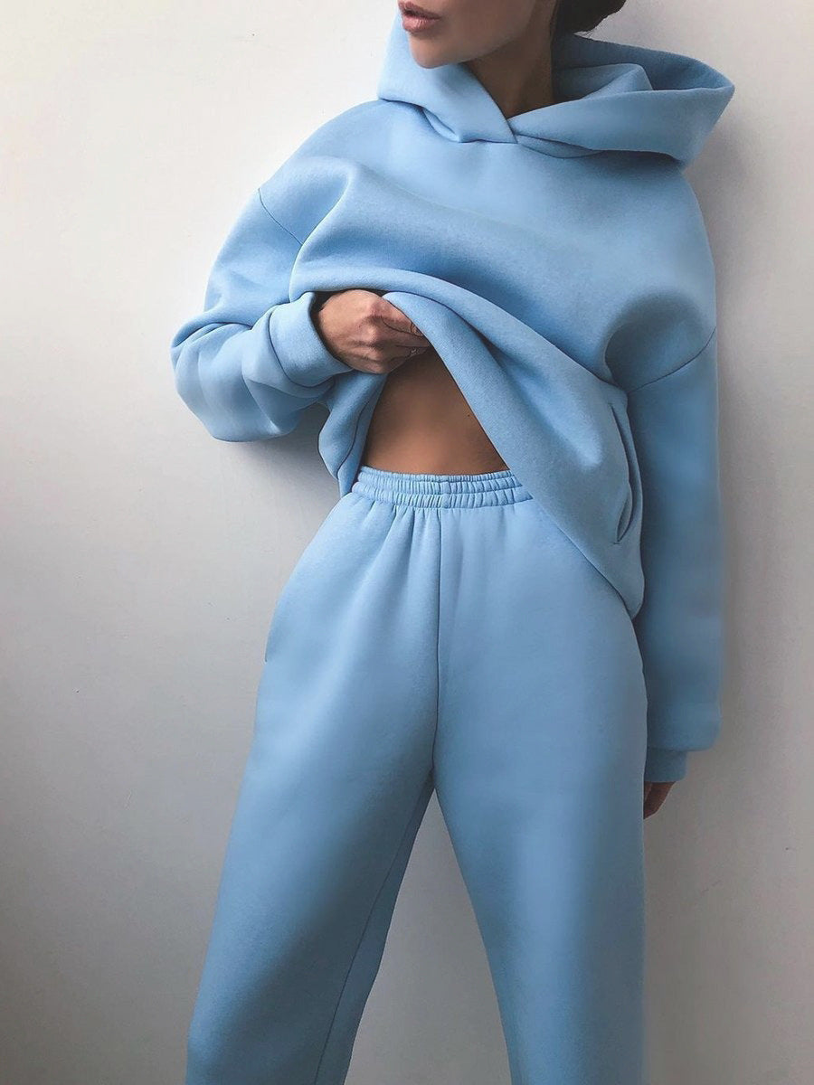 Women's zip-up jacket and jogger sweatsuit set in blue