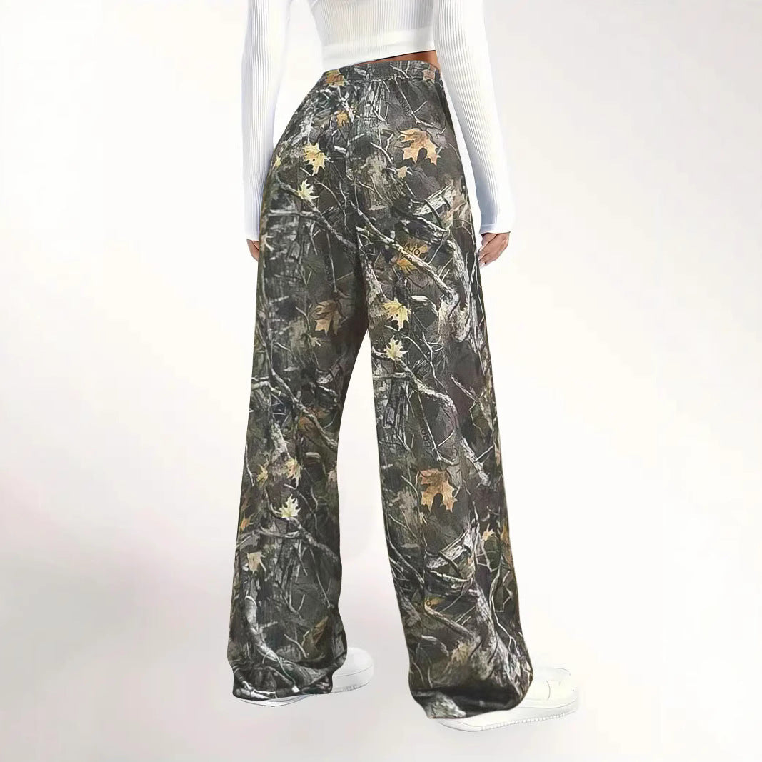Women's green camouflage cargo pants pocket detail