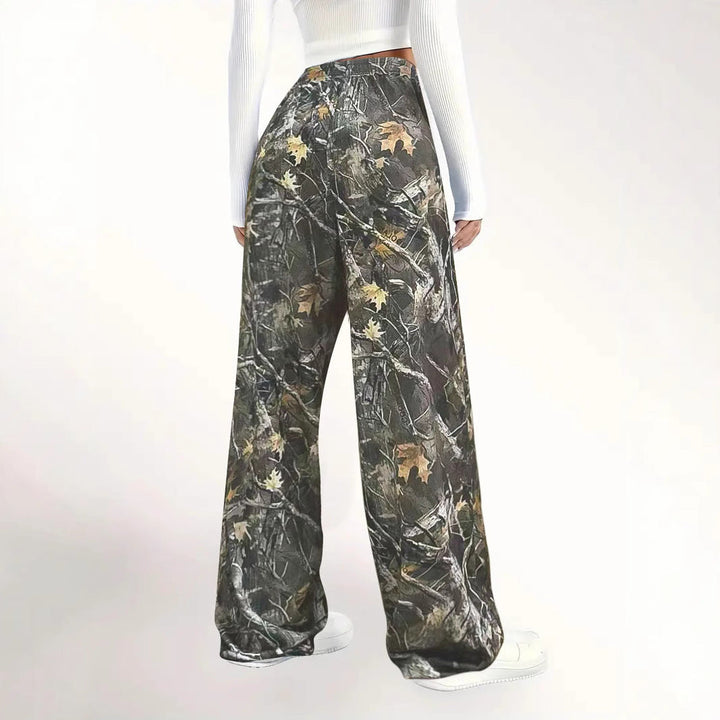 Women's green camouflage cargo pants pocket detail