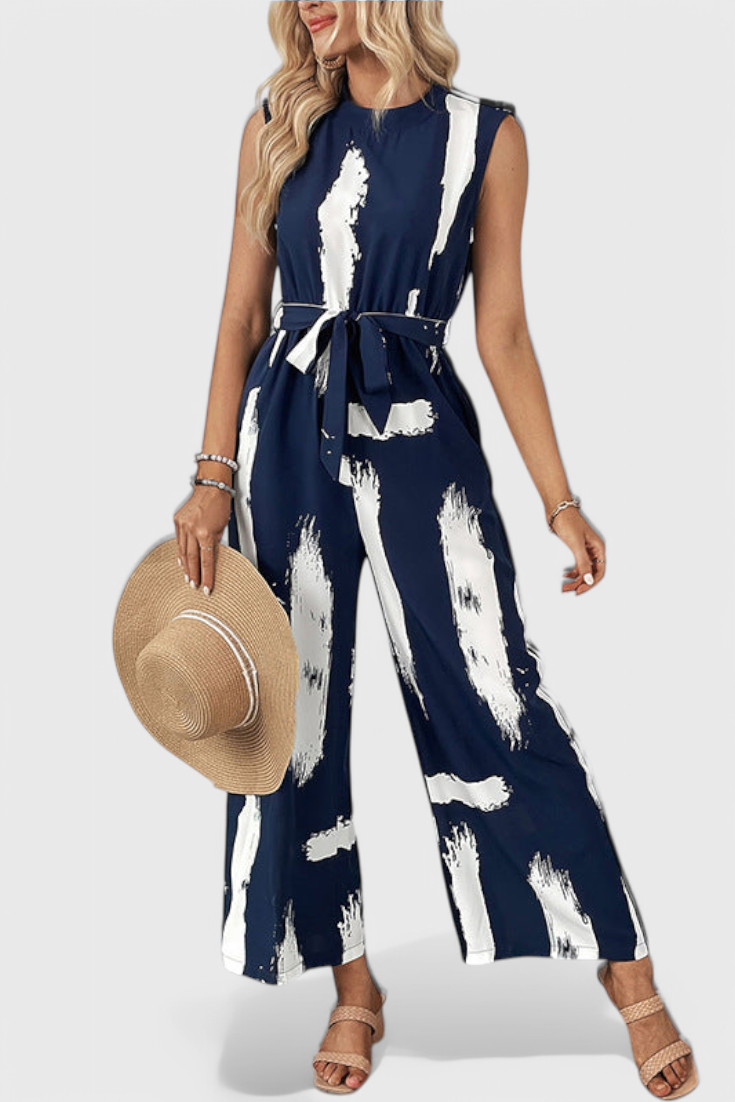 Women's printed sleeveless tied waist wide leg jumpsuit in multicolour