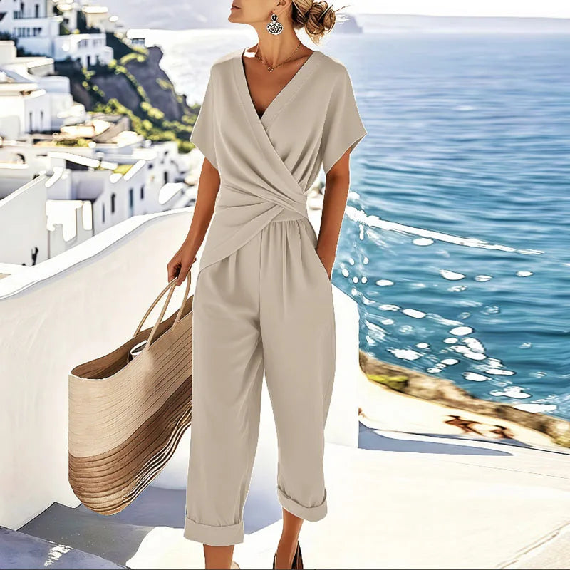 Elegant wrap-front two-piece set with tailored trousers in apricot