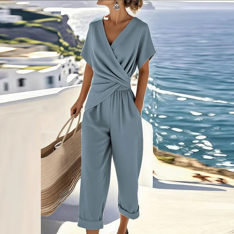 Elegant wrap-front two-piece set with tailored trousers in blue