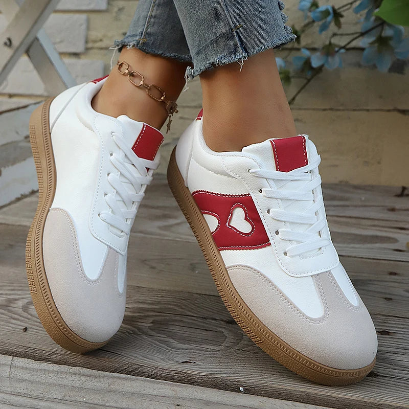 Women's heart cutout panelled gum sole lace up sneaker in white