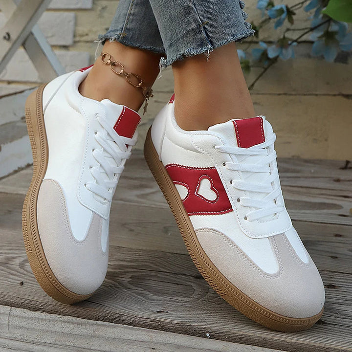 Women's heart cutout panelled gum sole lace up sneaker in white