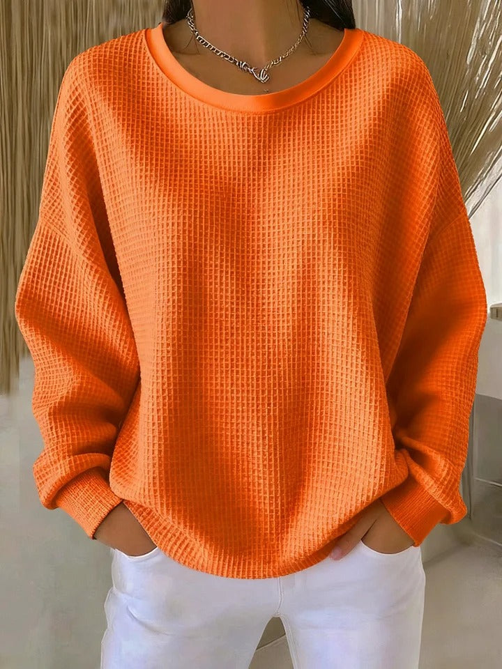 Women's orange waffle knit sweater