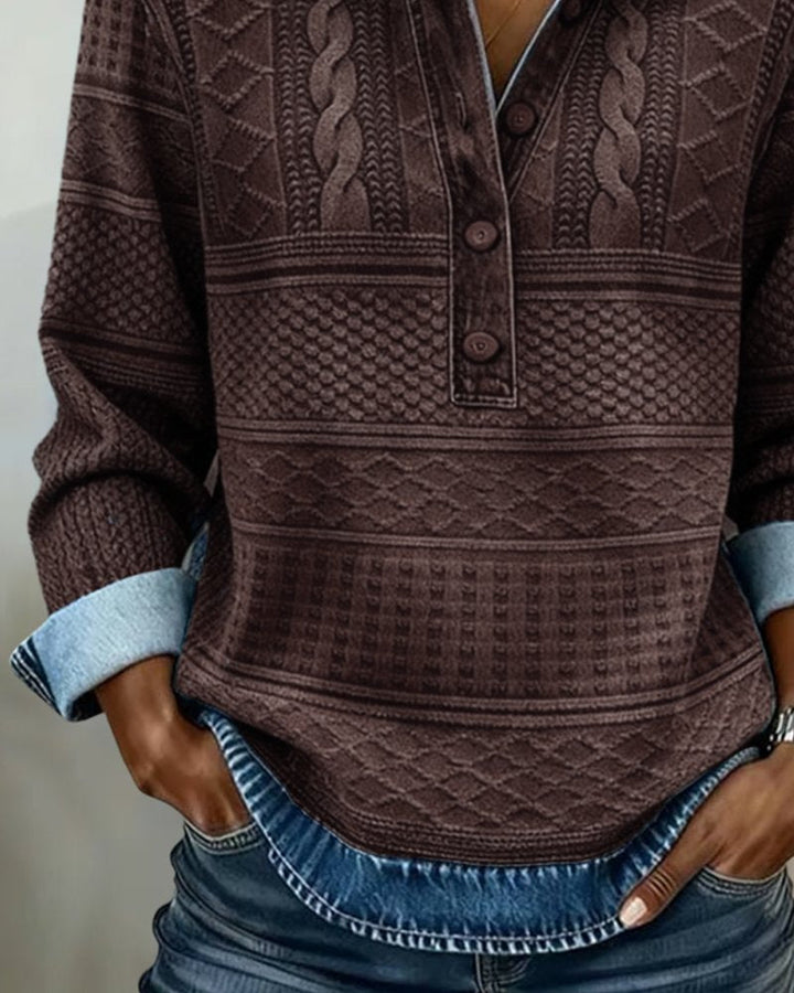 Half-button placket detail on the knit sweater