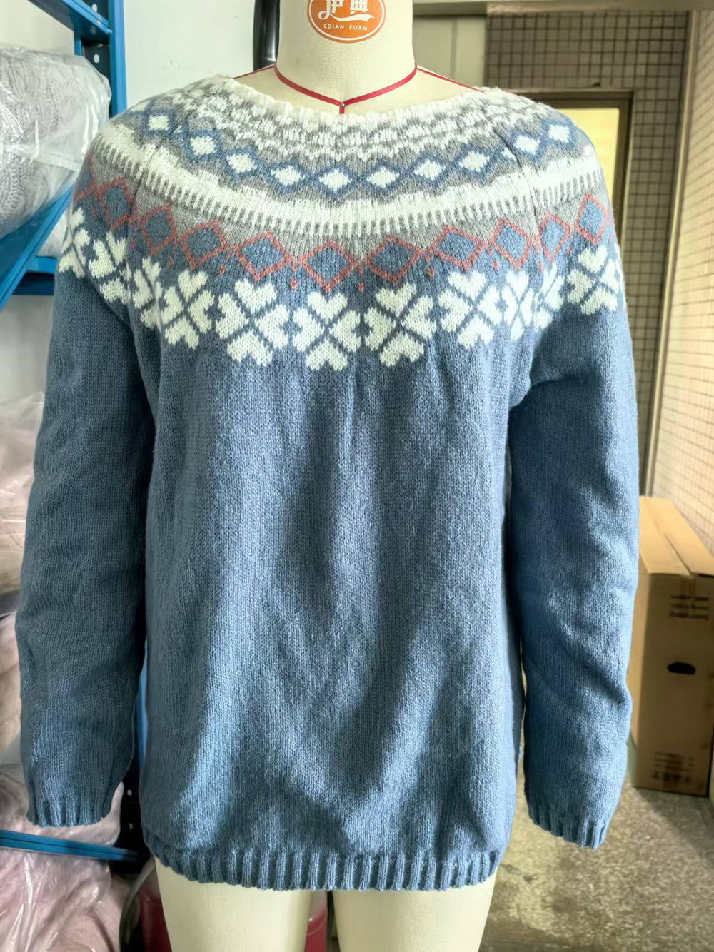 Women's reindeer knit Christmas sweater in blue