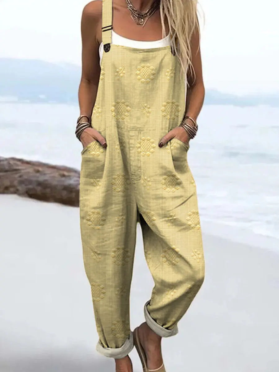 Relaxed strappy jumpsuit with pockets in light yellow