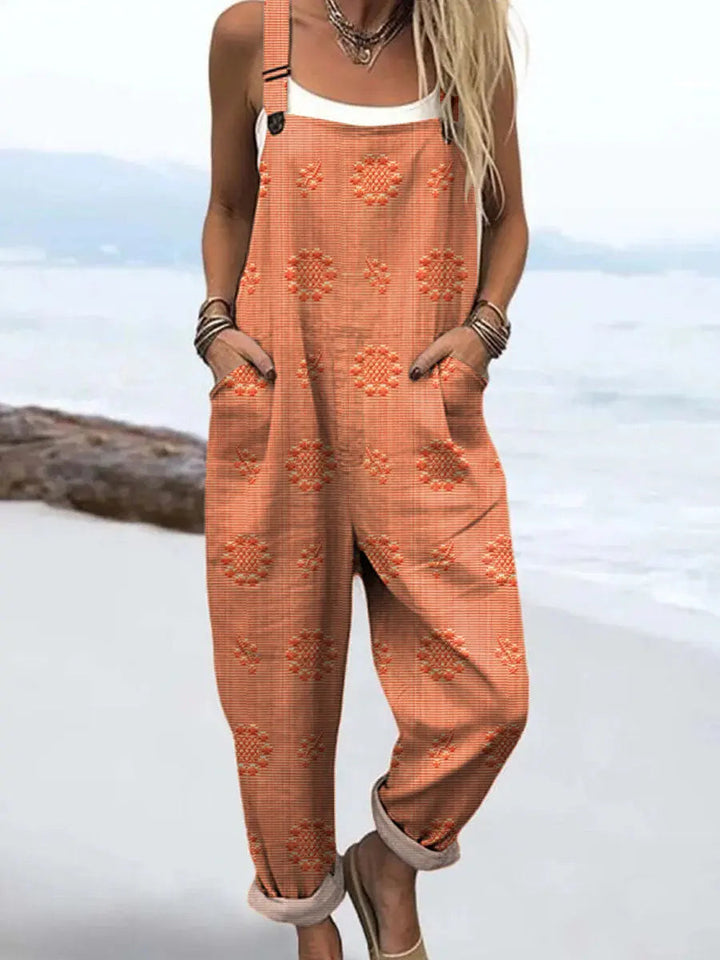 Relaxed strappy jumpsuit with pockets in orange