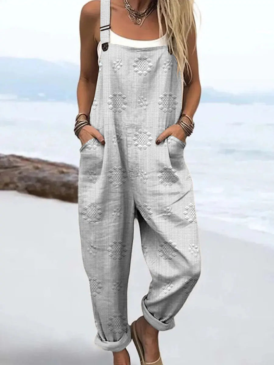 Relaxed strappy jumpsuit with pockets in white