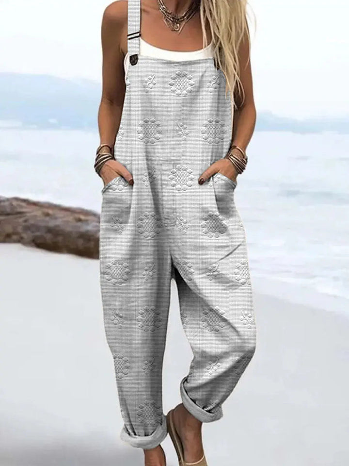 Relaxed strappy jumpsuit with pockets in white
