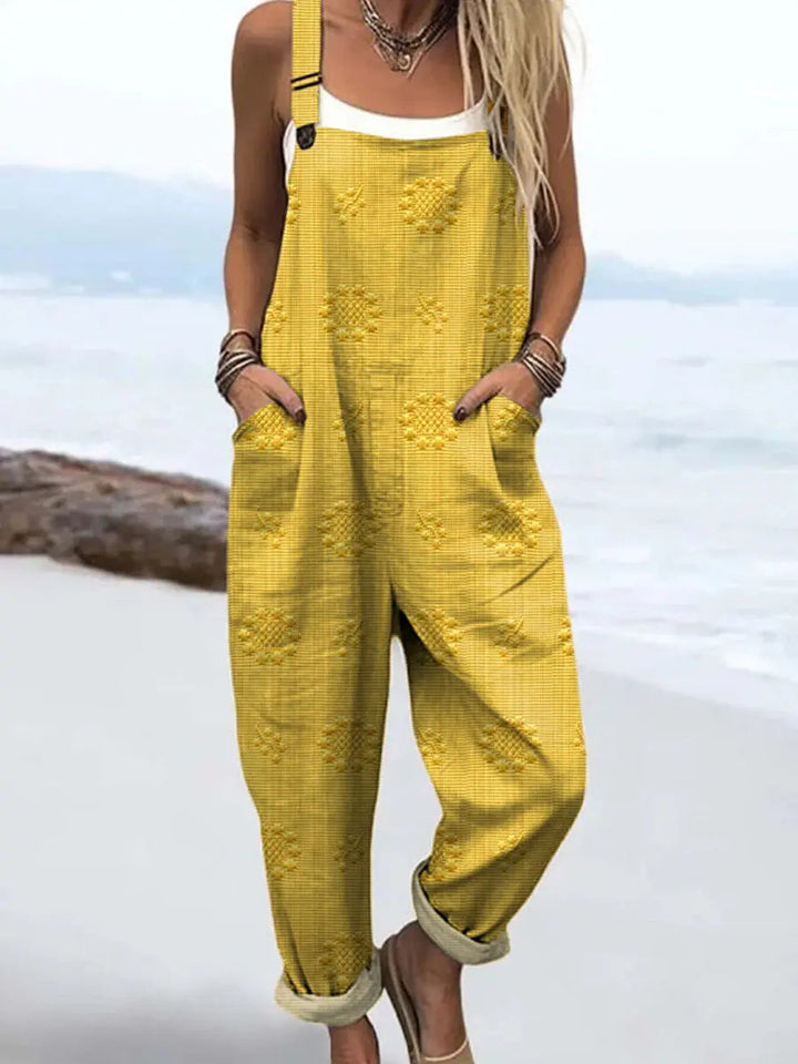 Relaxed strappy jumpsuit with pockets in yellow