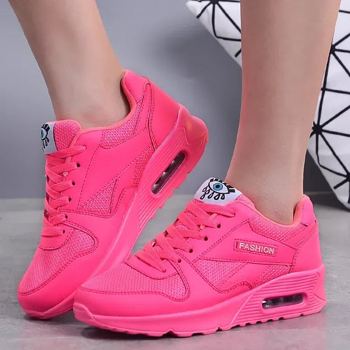 Fuchsia lace up low top eye graphic sneakers