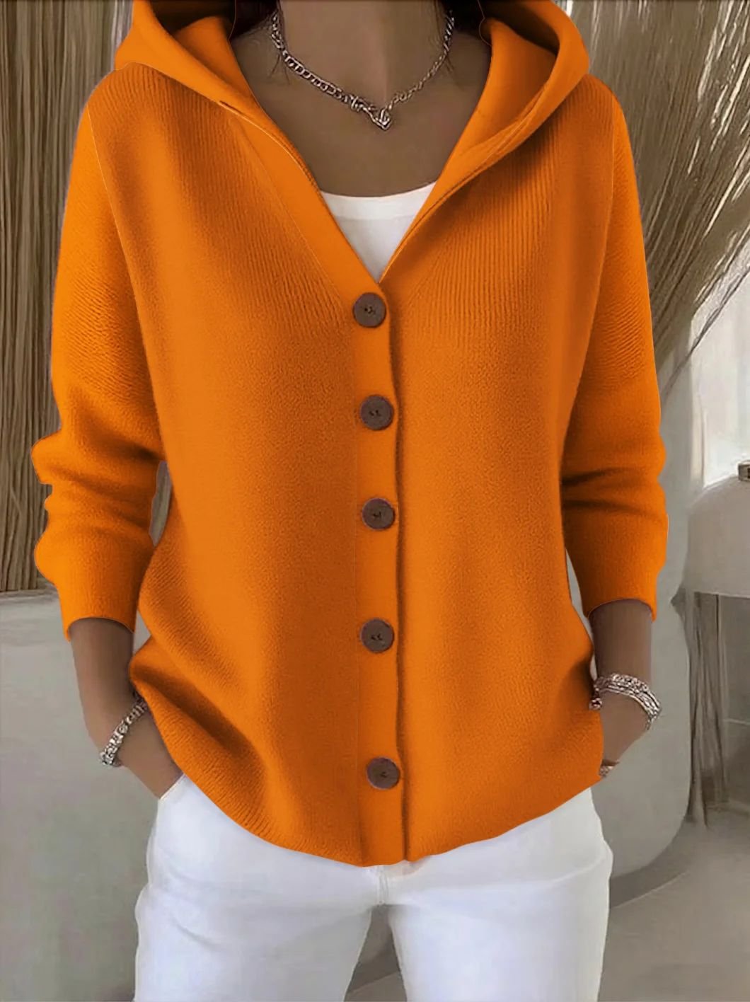 Women's hooded button-front knit cardigan in orange