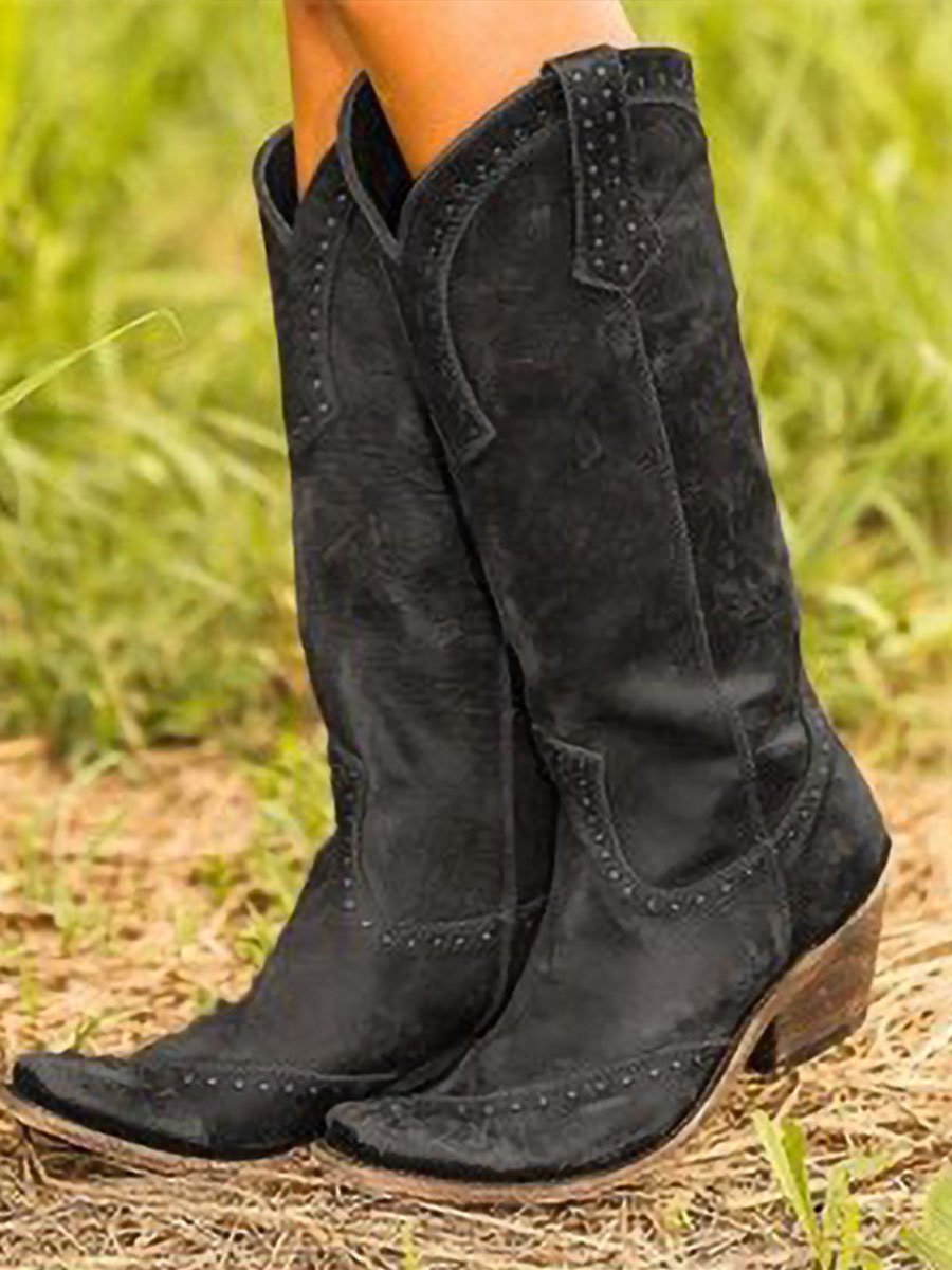 Black studded knee-high cowboy boots for women