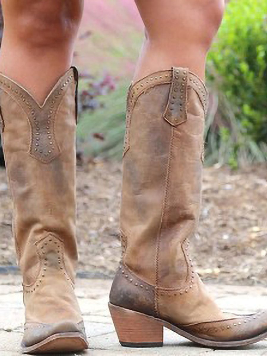 Yellow studded knee-high cowboy boots for women