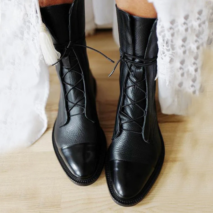 Black lace-up ankle boots with polished toe cap for women
